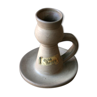 Hand-held sandstone candlestick