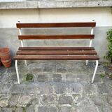 Bench in dark wood and white metal