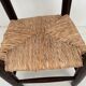 Wooden children's chair with vintage straw seat