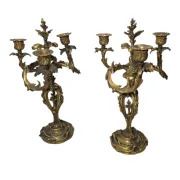 Pair of Louis XV style bronze candlesticks from the 19th century.