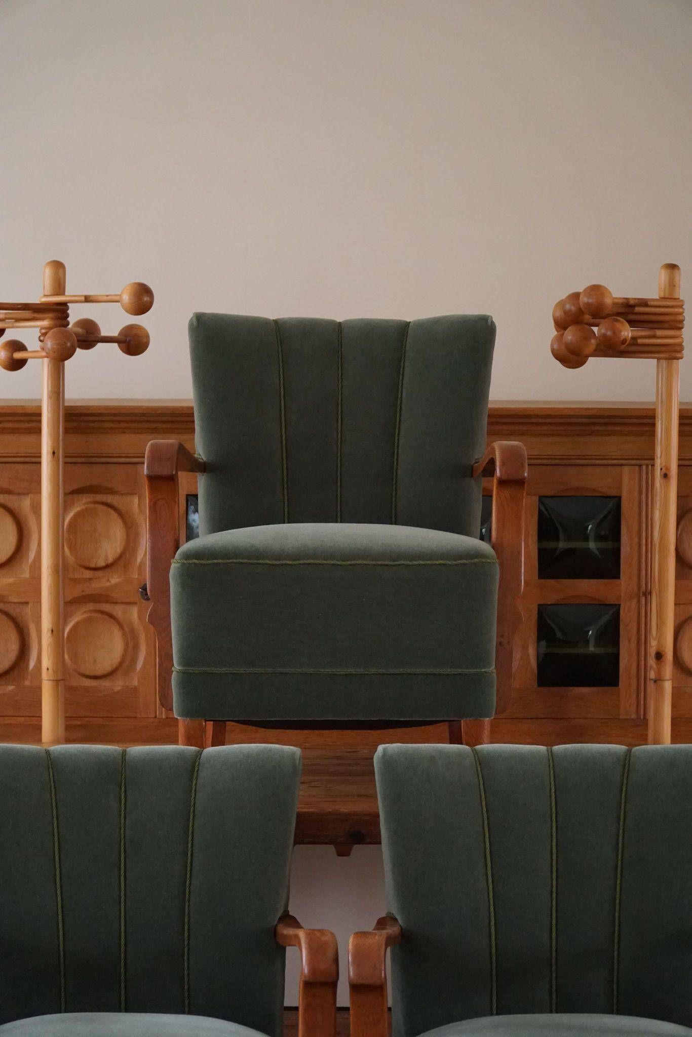 Danish Art Deco, set of 3 oak armchairs, reupholstered in green mohair, 1930s.
