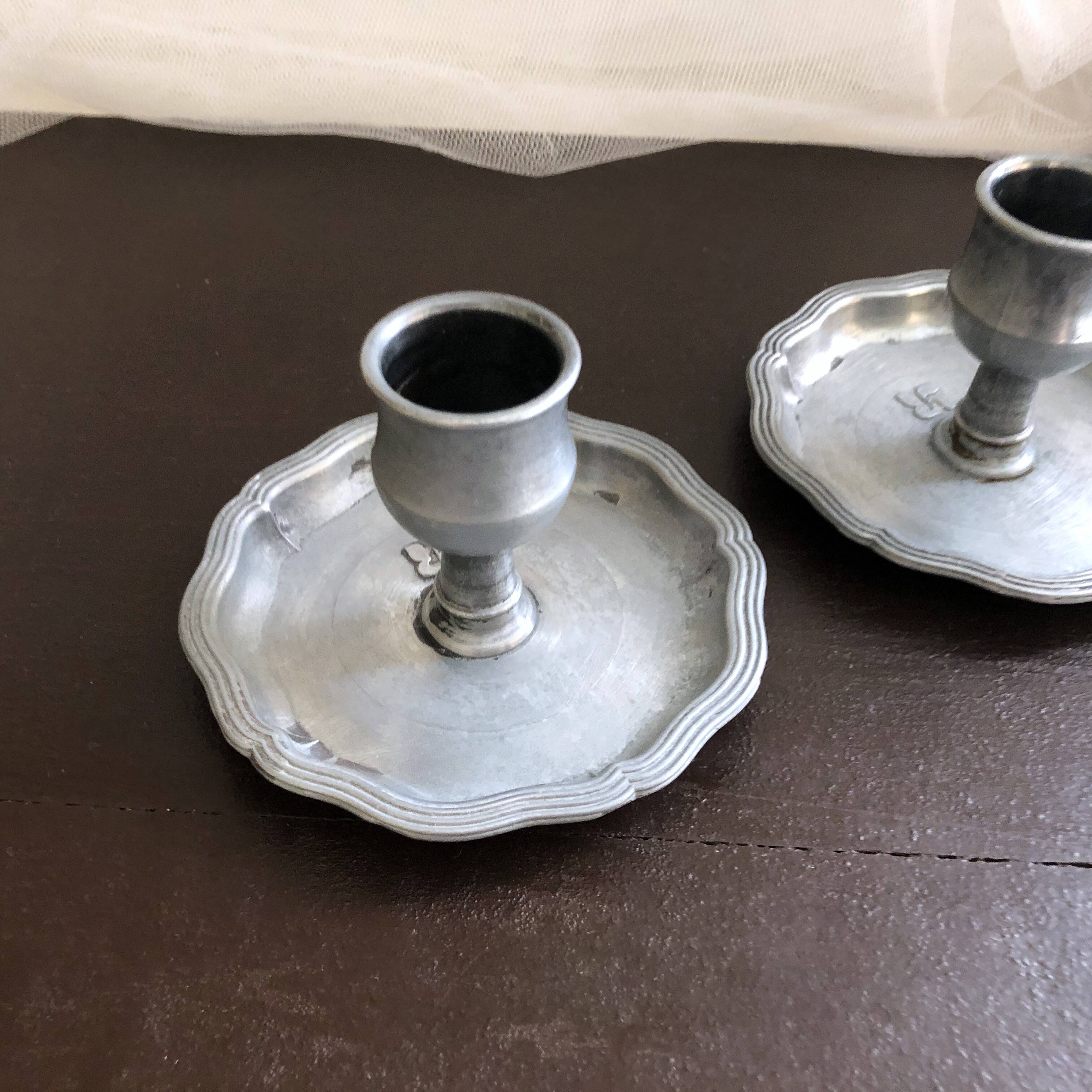 Pair of pewter table candlesticks