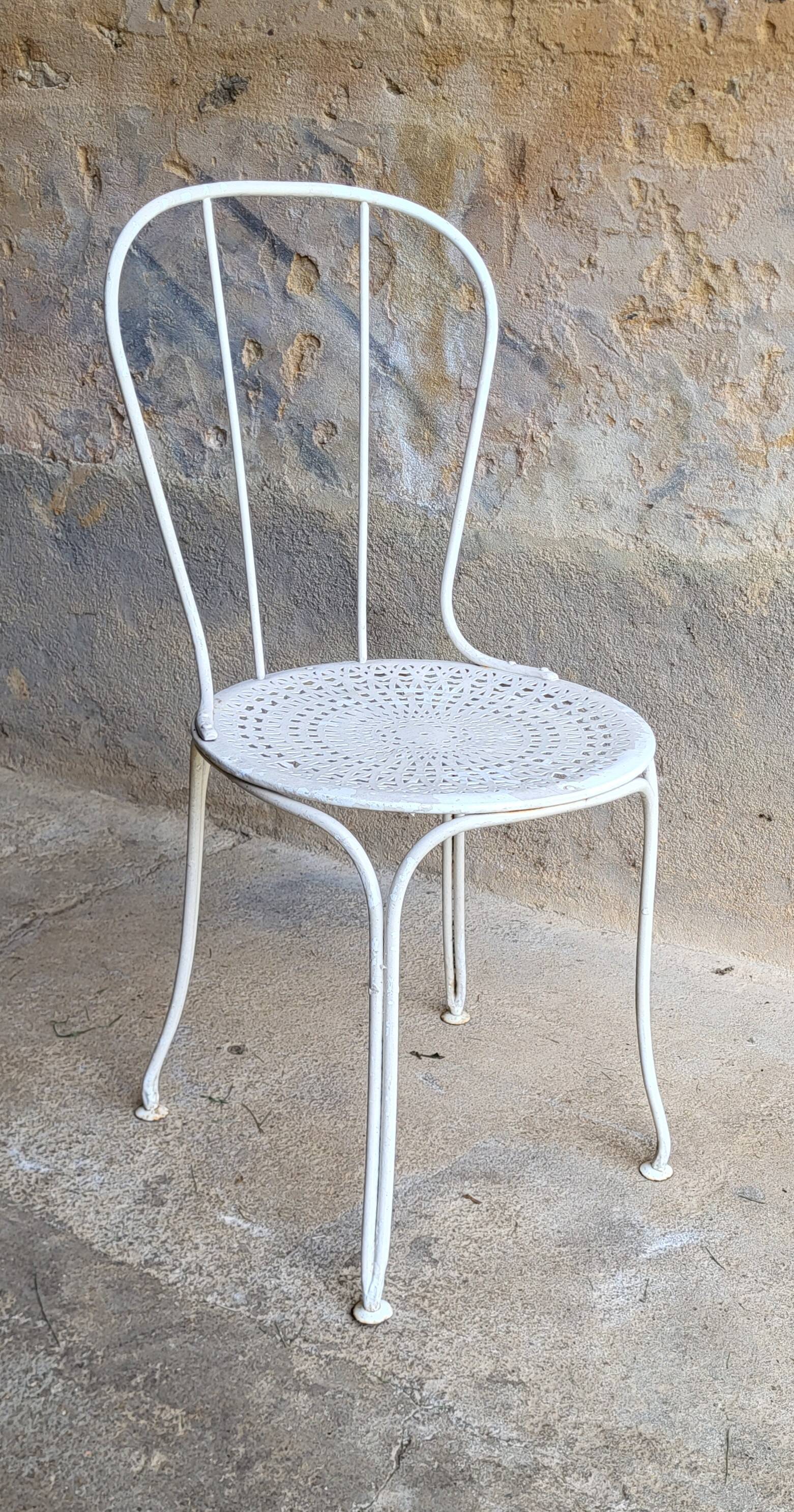 Pair of iron garden chairs