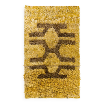 Tapis shag vintage noué à la main avec un design géométrique marron sur un fond jaune, 100 % laine mohair.