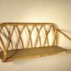Rattan wall shelf