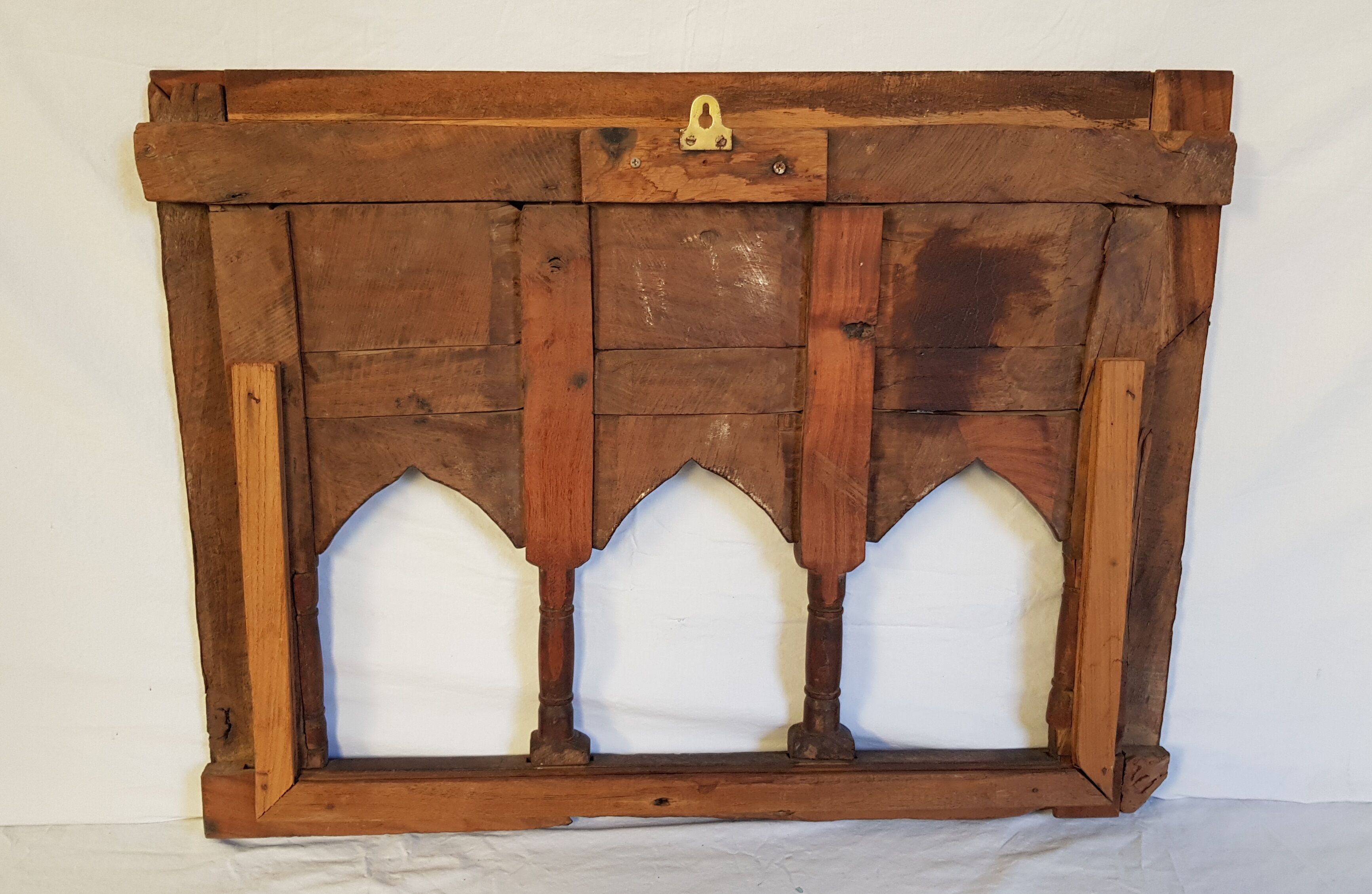Carved wooden window with rear support for possible mirror