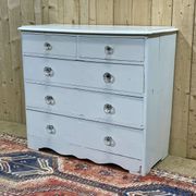English chest of drawers painted in fir with glass knobs, 19th century