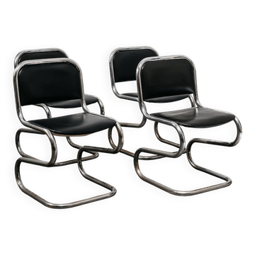 Ensemble de 4 chaises à bascule en acier chromé design années 80 vintage moderne.