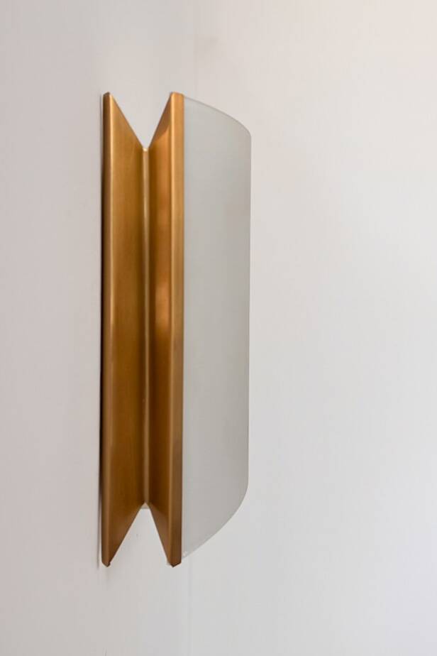 Pair of vintage brass and curved glass wall lights, France, 1970.