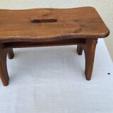 Old small vintage farm stool