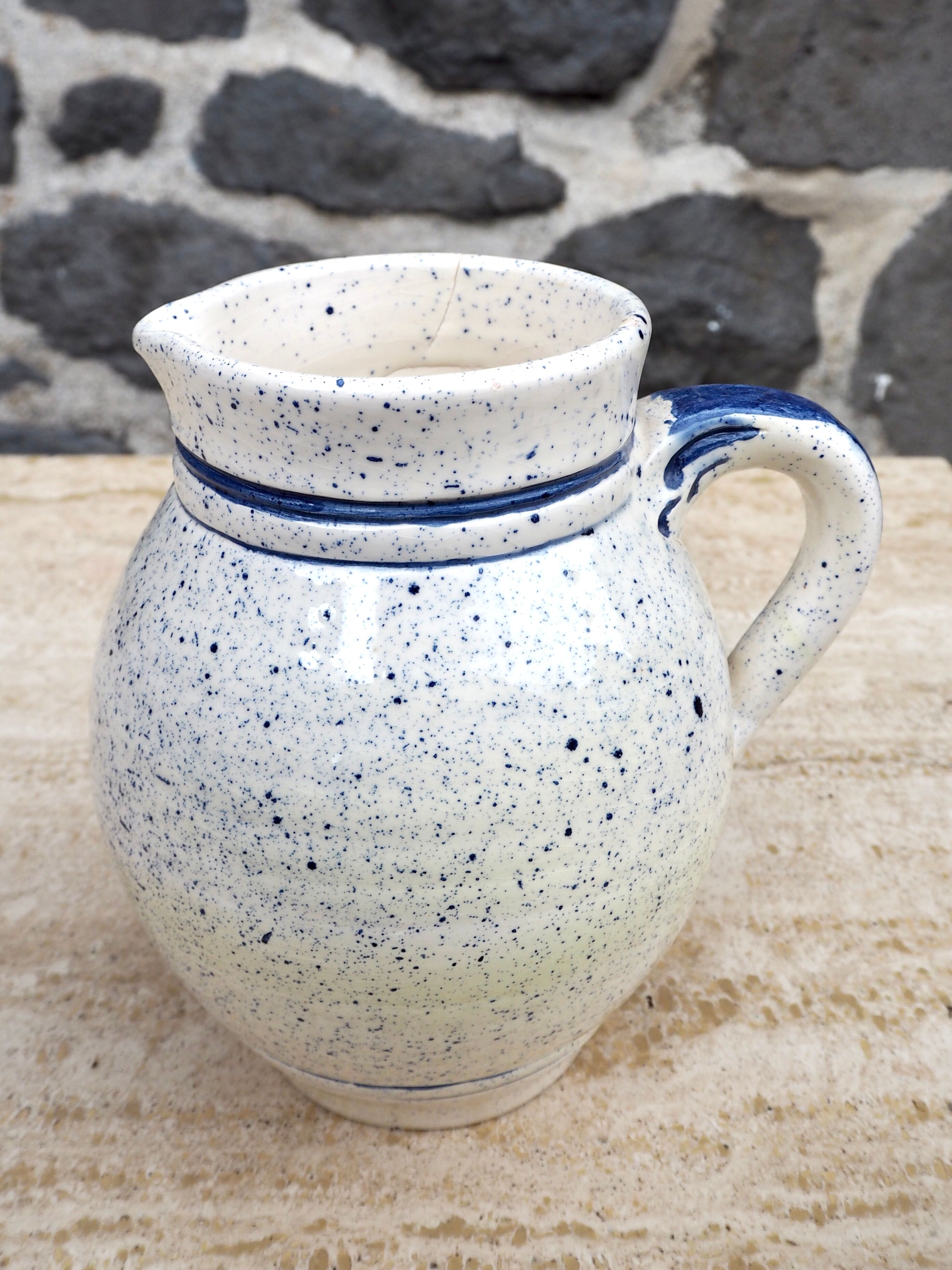 Speckled ceramic pitcher