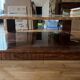 Varnished coffee table in exotic wood