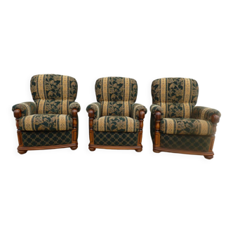 Three armchairs in cherry wood of French manufacture covered with a green velvet beige print