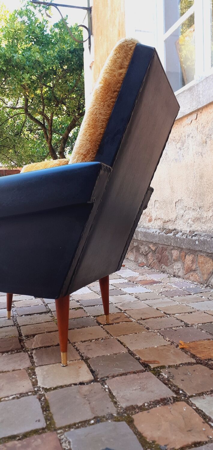 Pair of vintage 60s armchairs in black imitation leather and mustard toffee
