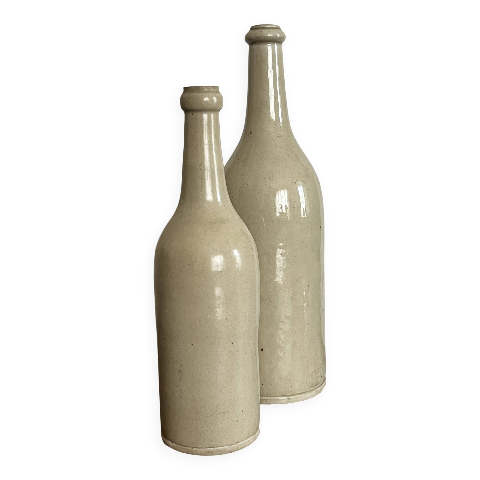 Pair of old glazed stoneware bottles