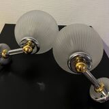 Pair of Inda metal and chiseled glass wall lights
