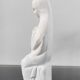 Vintage white plaster statuette of the Virgin Mary.