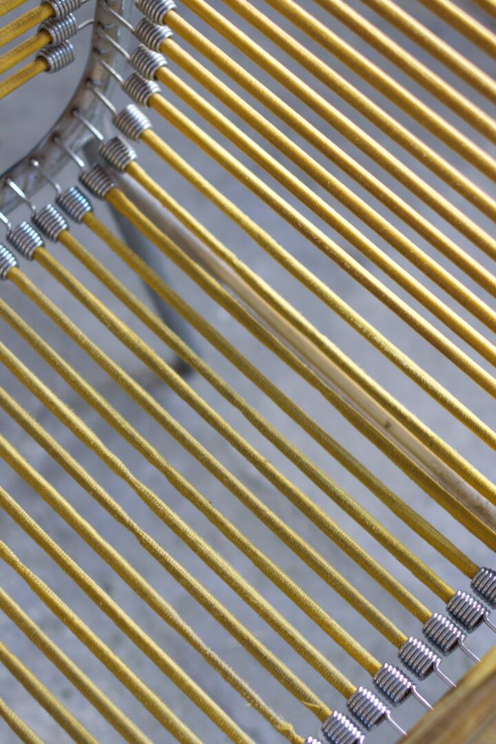 Two Rene Herbst Infabrica style Bungee armchairs