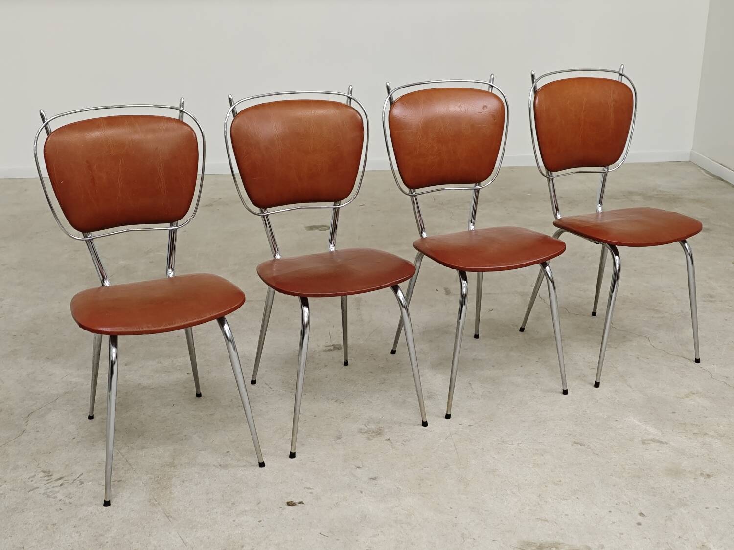 Set of 4 French chairs in camel brown imitation leather and chrome 1960