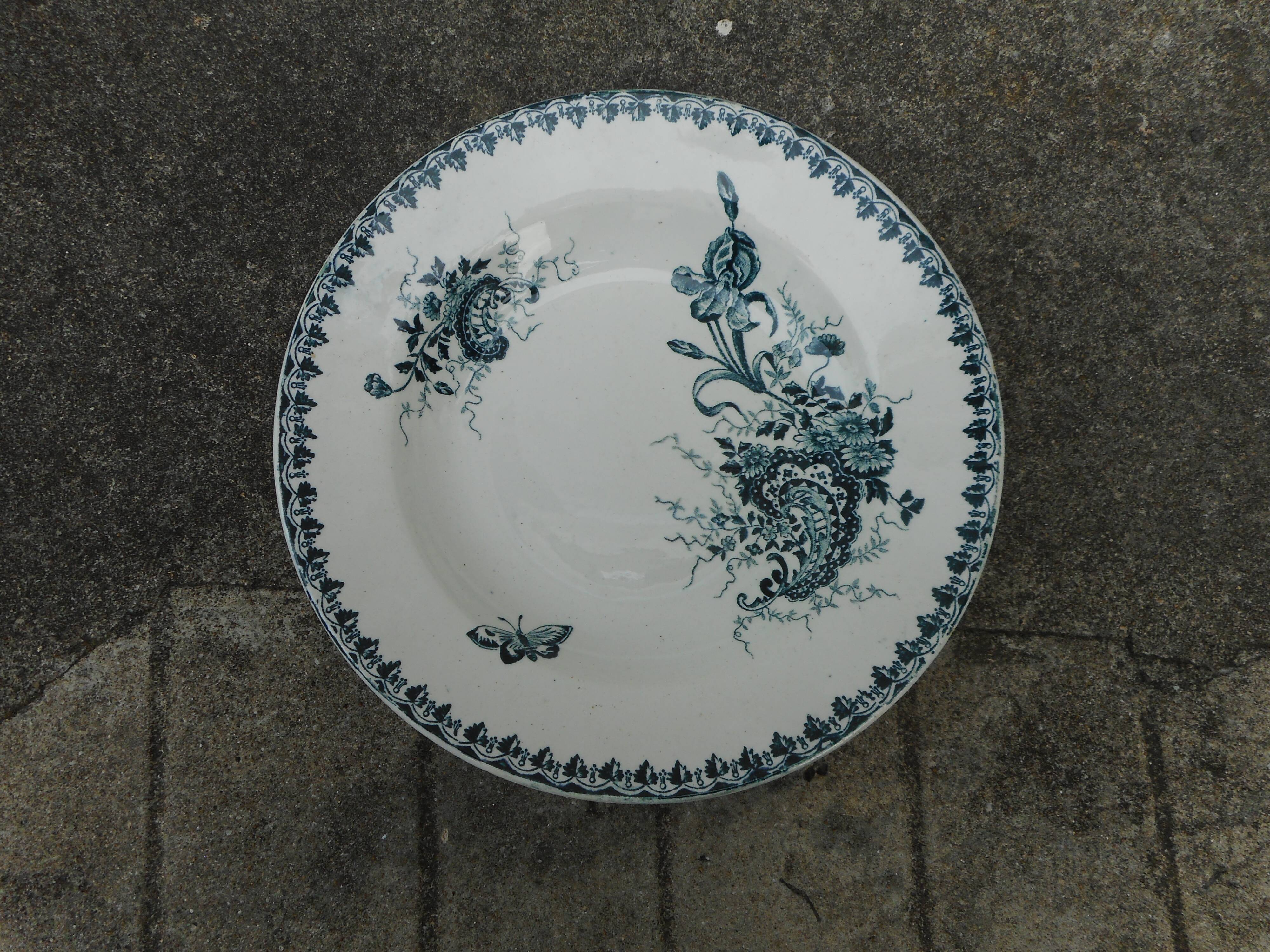 Two hollow plates made of earthenware