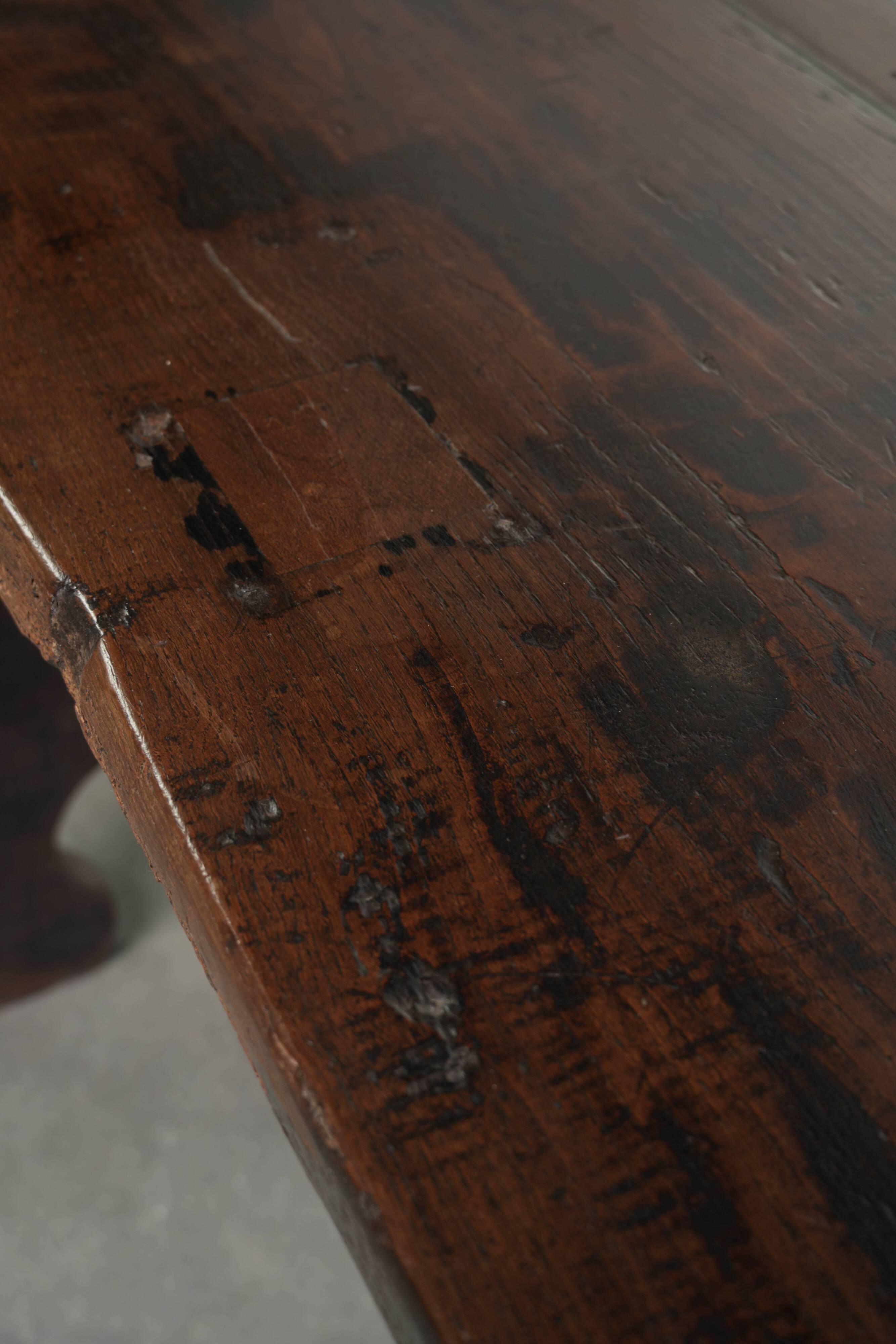 Antique Spanish table from the early 18th century with  a cast iron base