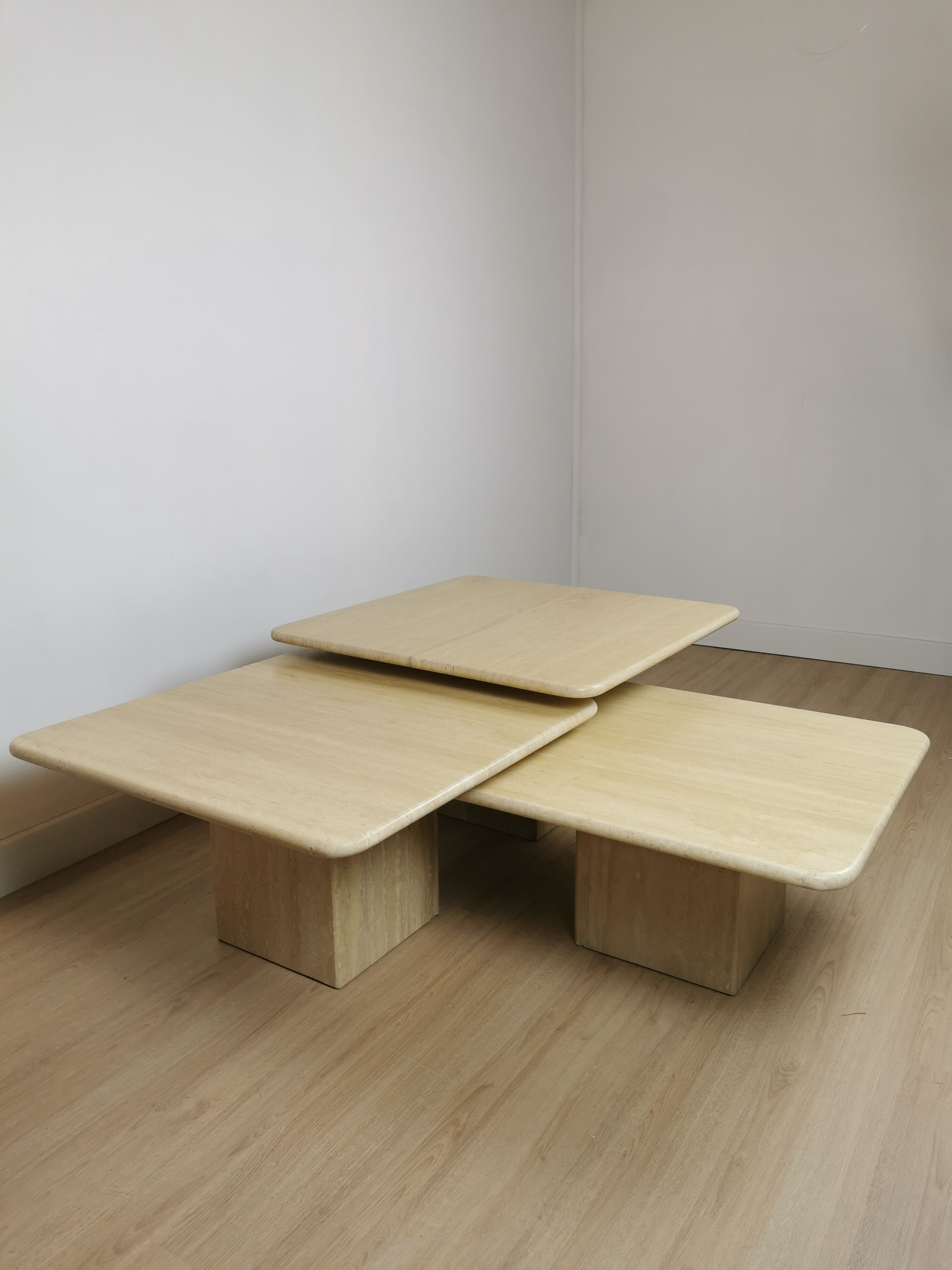 Side tables in travertine 70s
