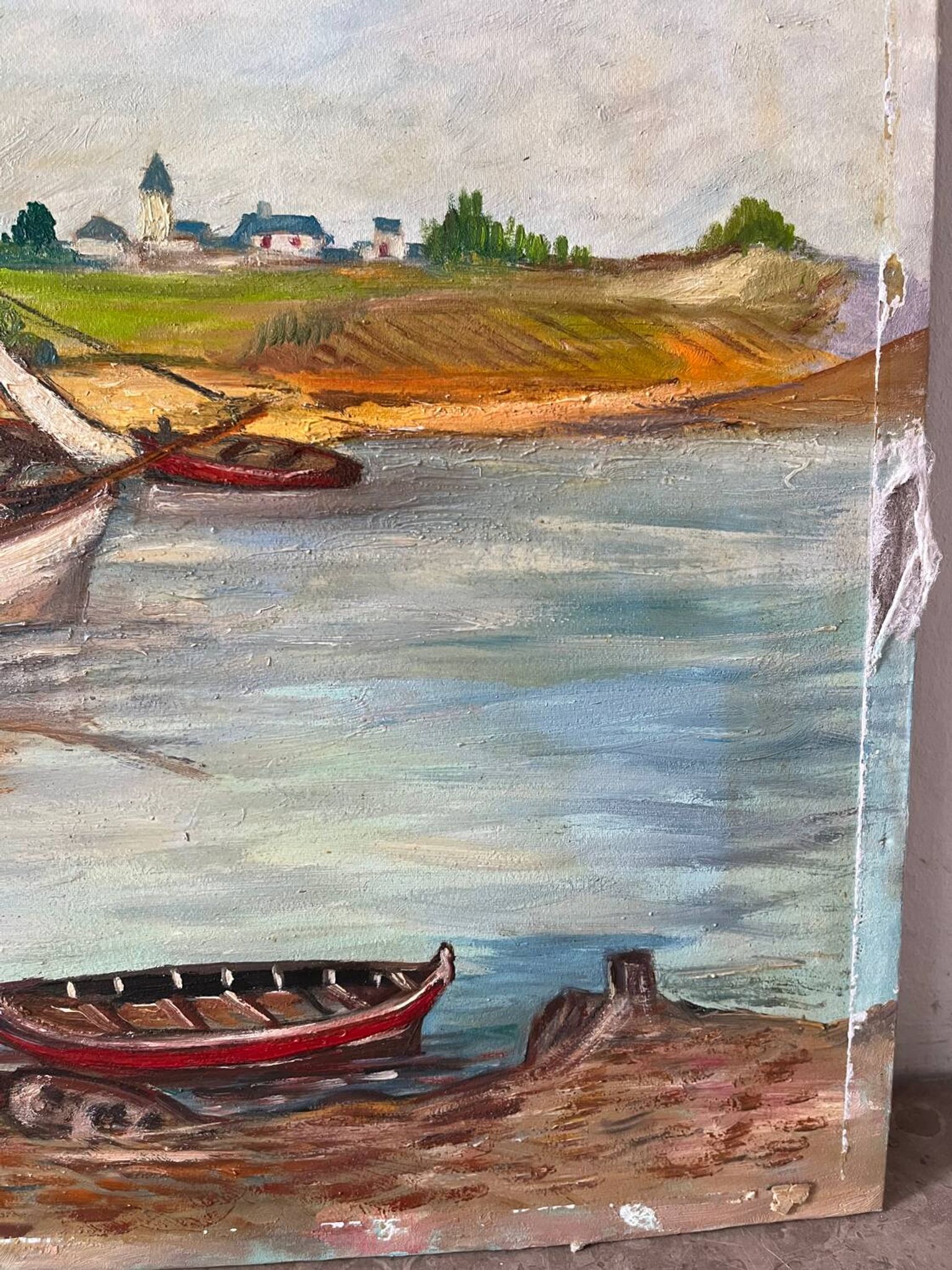Bateaux au petit port, signé F. Lombard