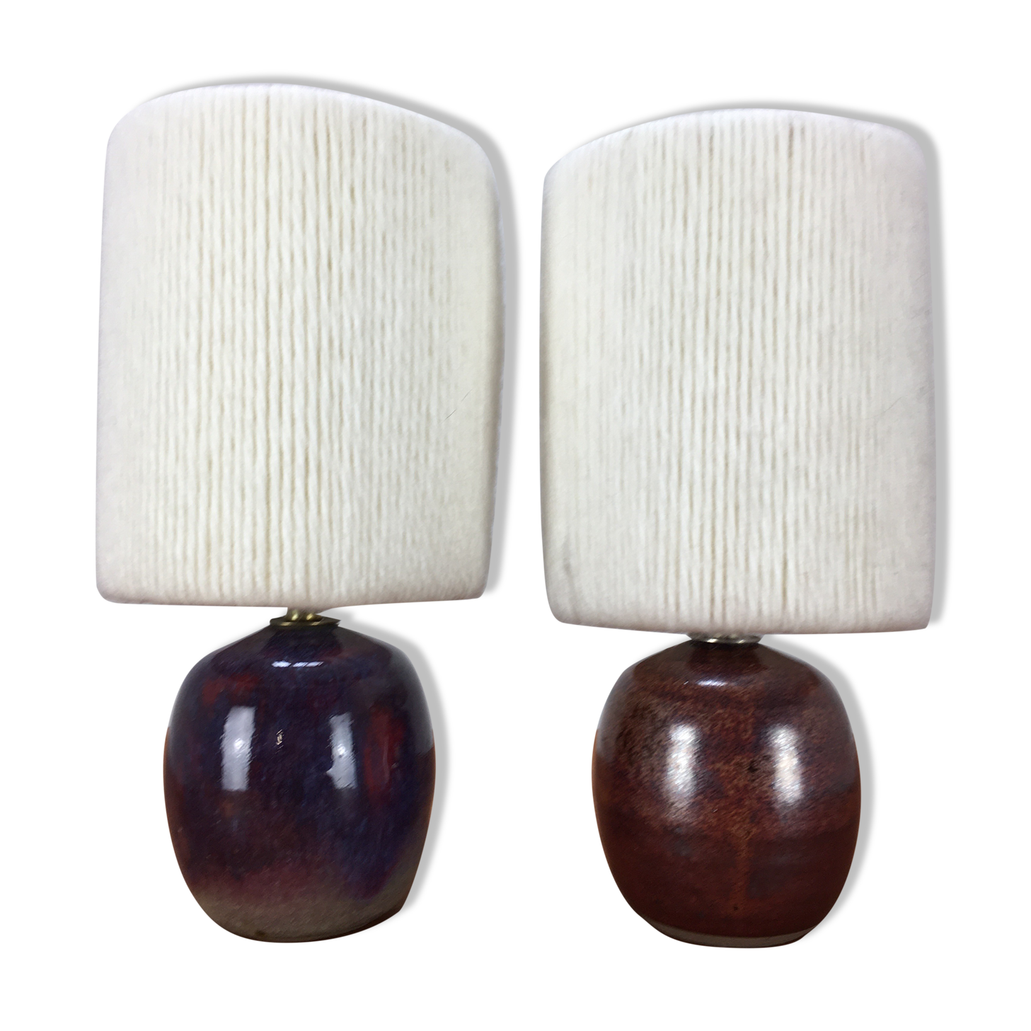 Pair of ceramic sandstone ball lamps and wool lampshades