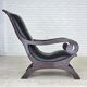 1970s, vintage armchair with footstool, black furniture leather.