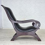 1970s, vintage armchair with footstool, black furniture leather.