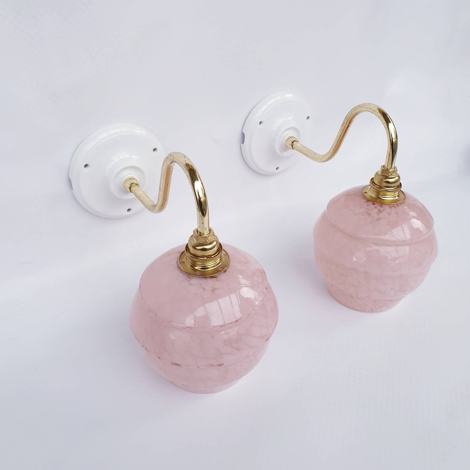 pair of vintage speckled pink and brass wall lights