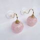 pair of vintage speckled pink and brass wall lights