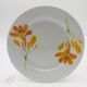 6 “Chriss G. Collection” porcelain dessert plates.