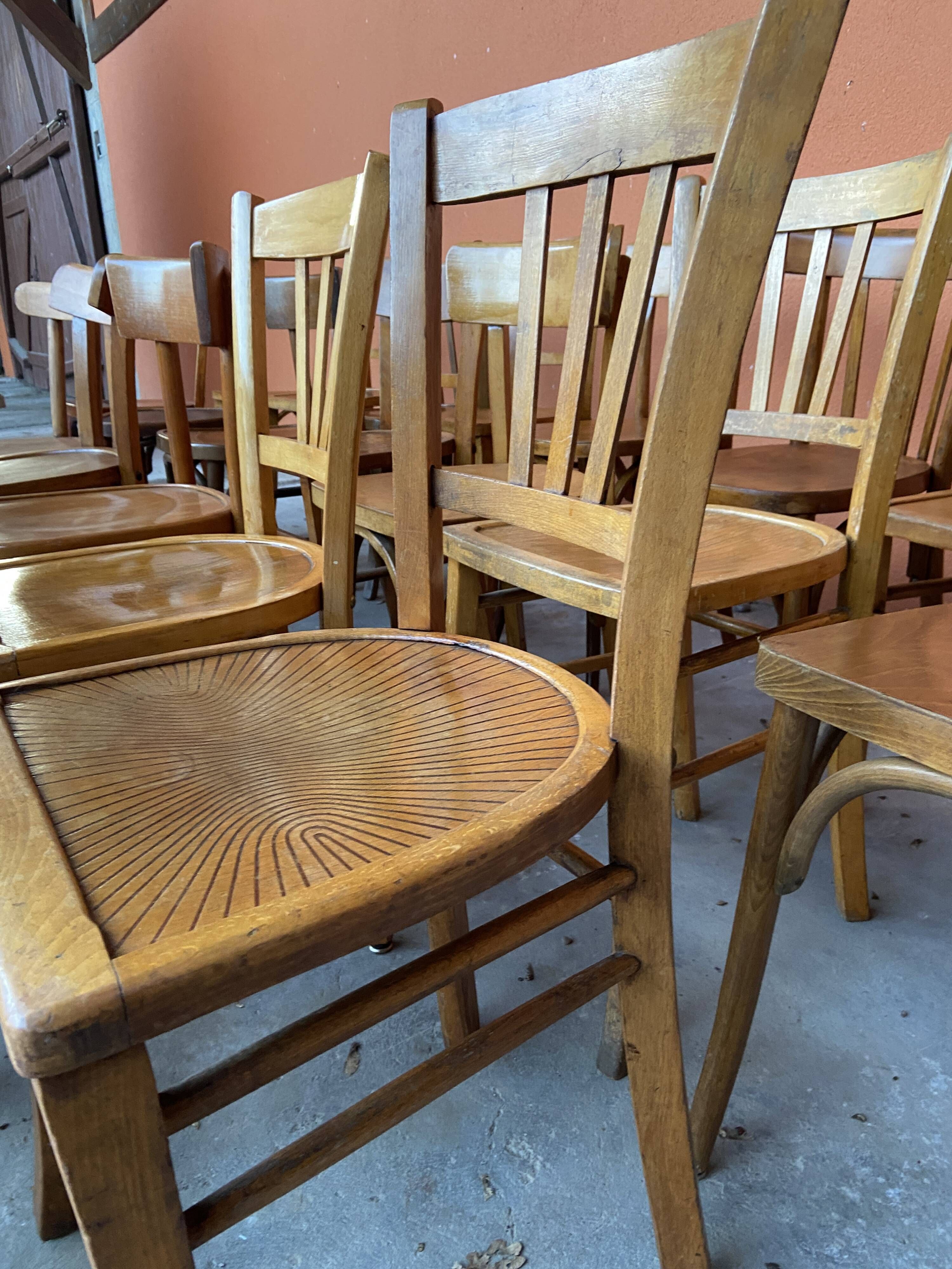 Set of 30 mismatched bistro chairs French Restaurant curved wood