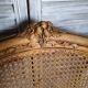 Antique wingback armchair