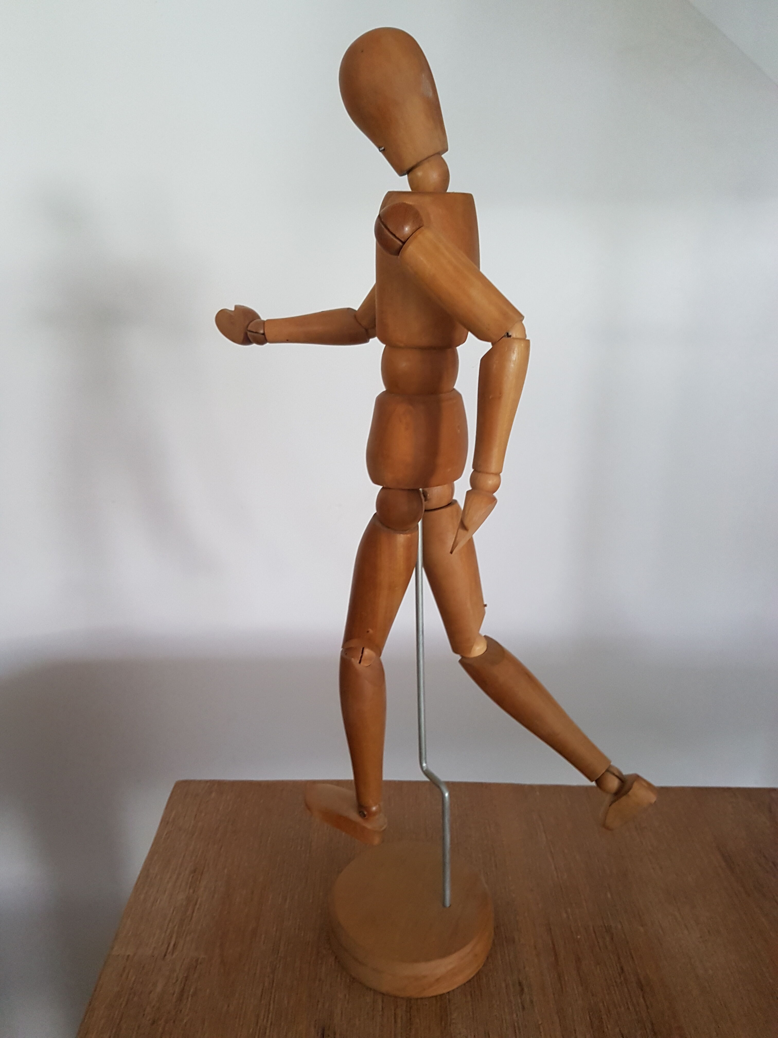 Articulated waxed wood puppet and 80's support
