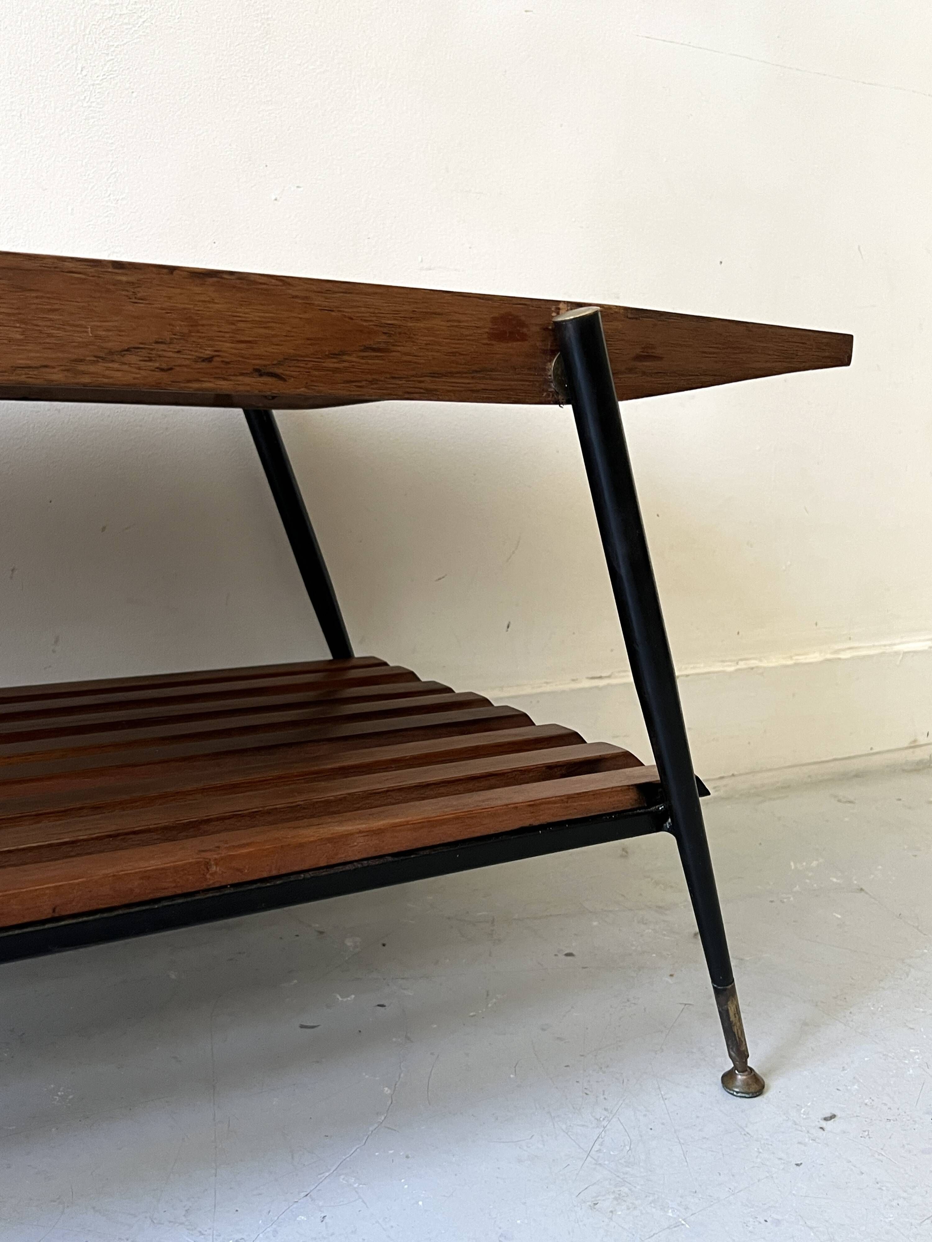 Mid-century coffee table with 2 mahogany wood tops and brass detail, Italy.