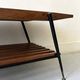 Mid-century coffee table with 2 mahogany wood tops and brass detail, Italy.