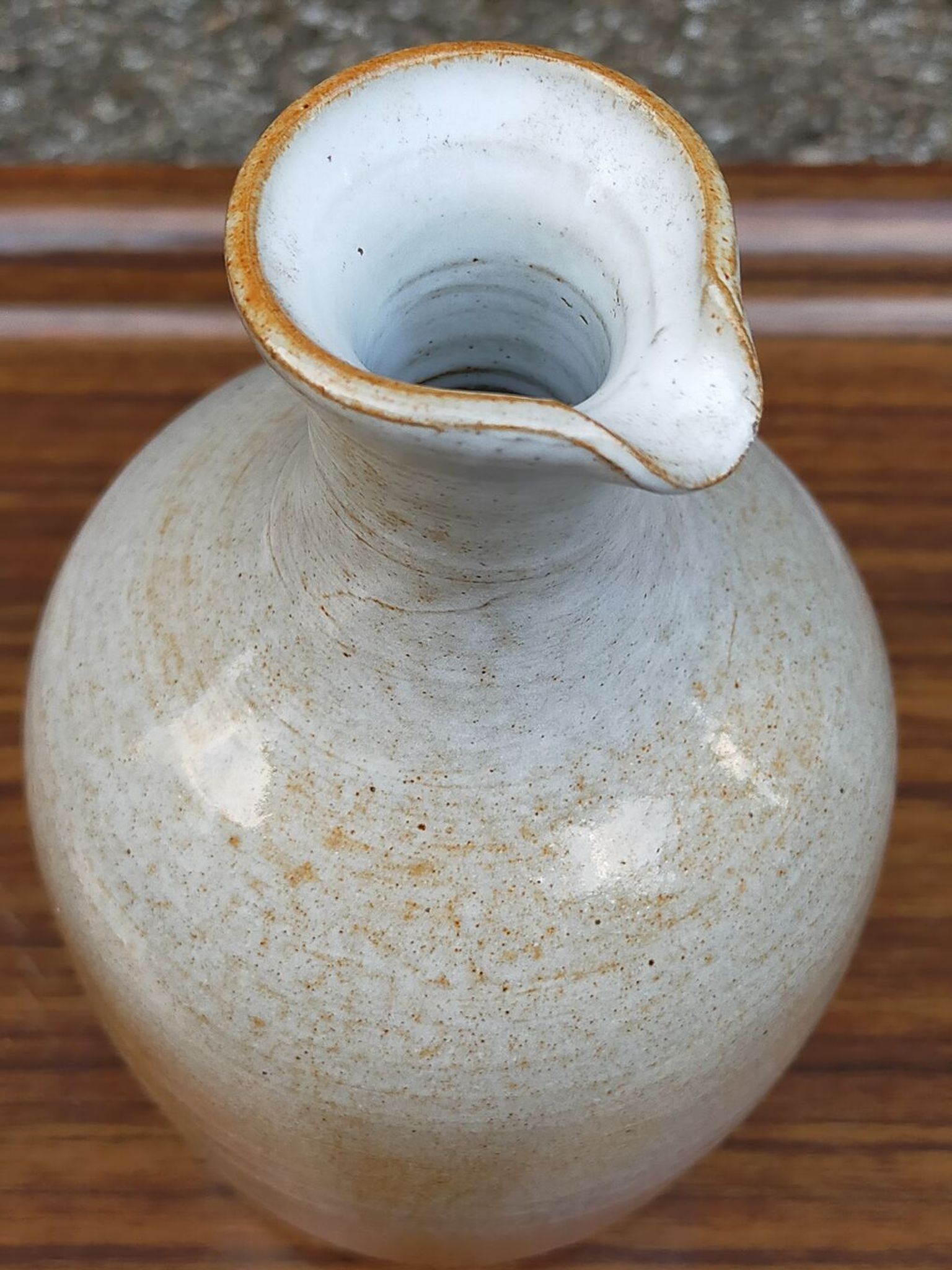 Light stoneware potter's bottle with vintage spout