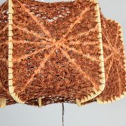 Brown wire and wood pendant light.