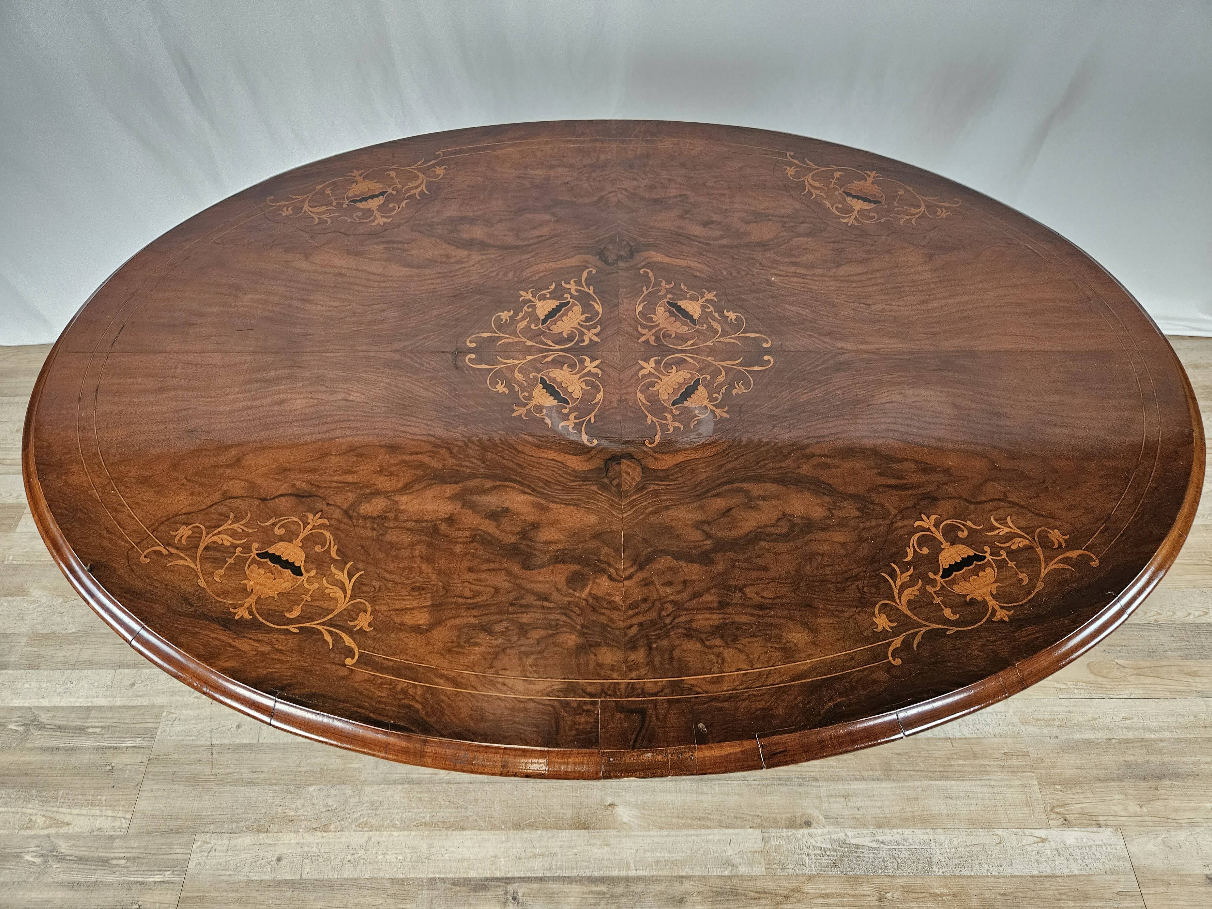 Coffee table in walnut with maple inlays and wheels