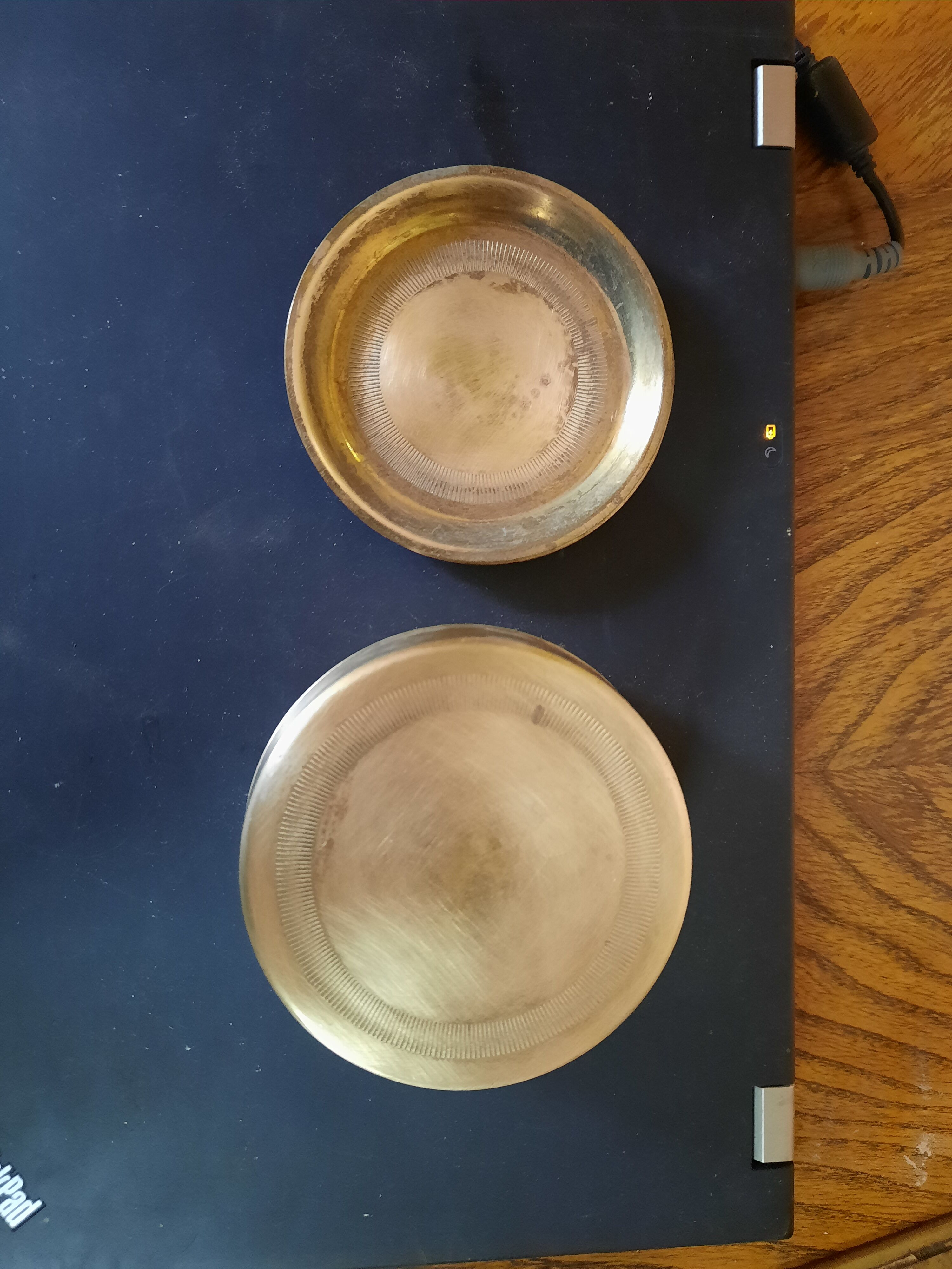 Set of brass coasters