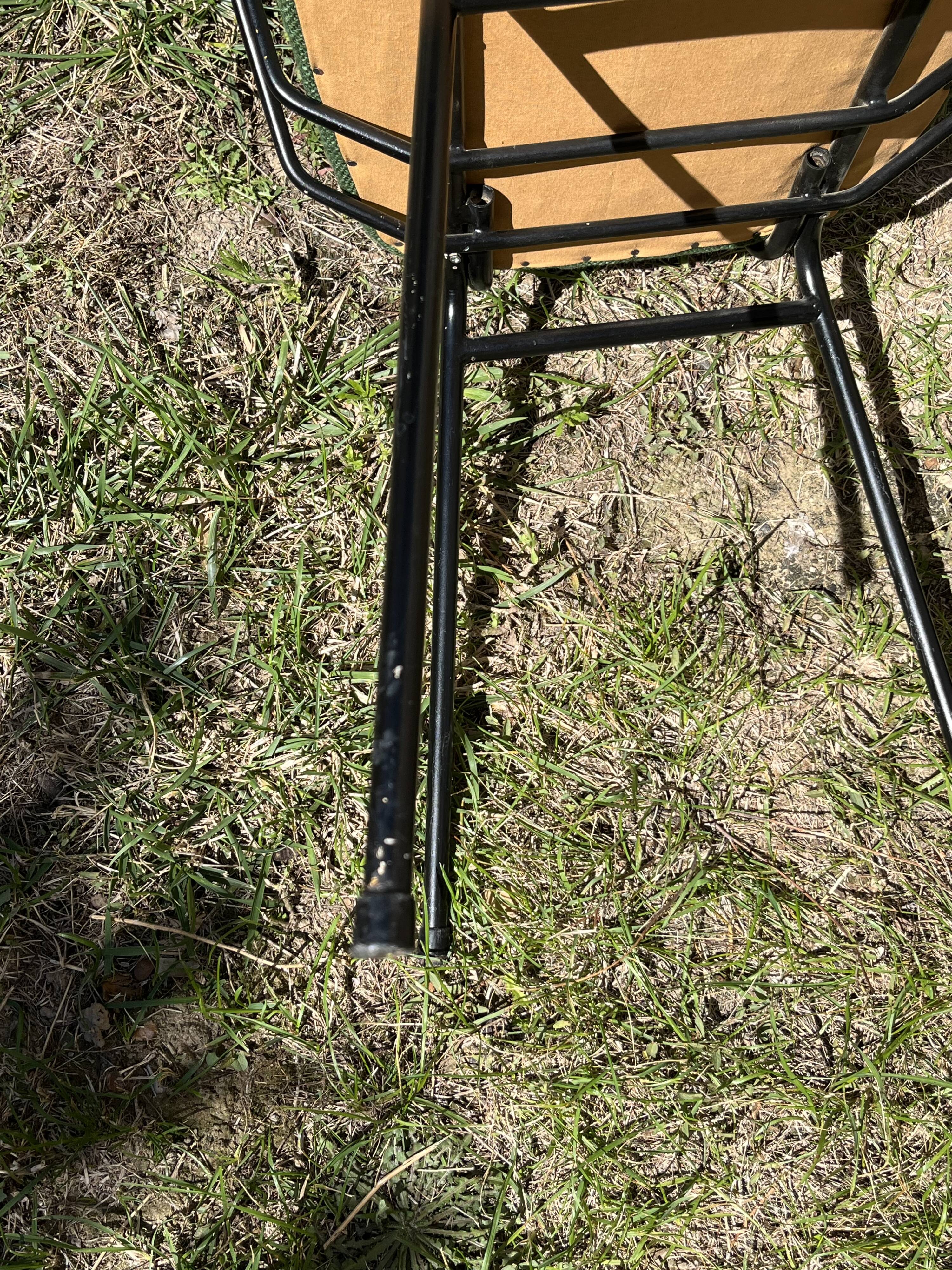 50s chair with armrests.