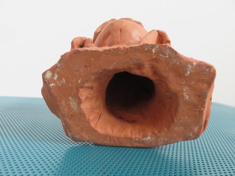 Ancient terracotta bust statue