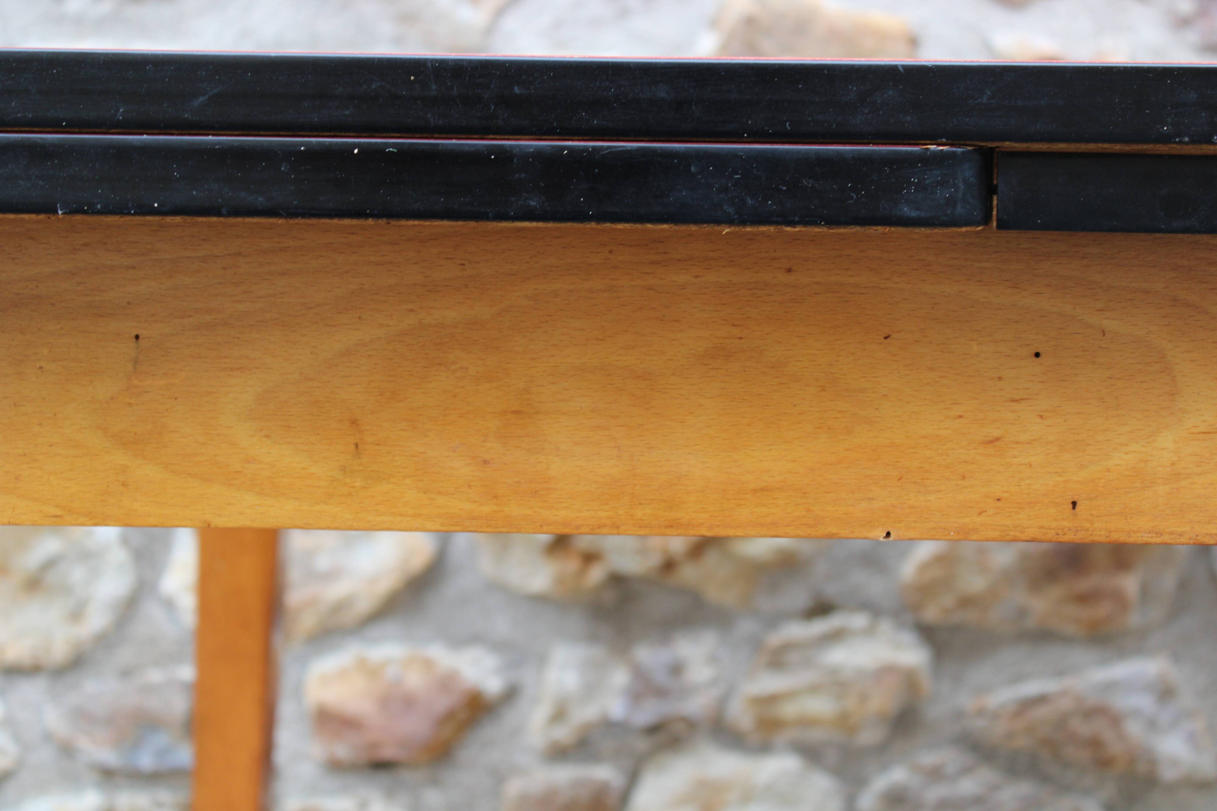 Extendable wooden and formica table