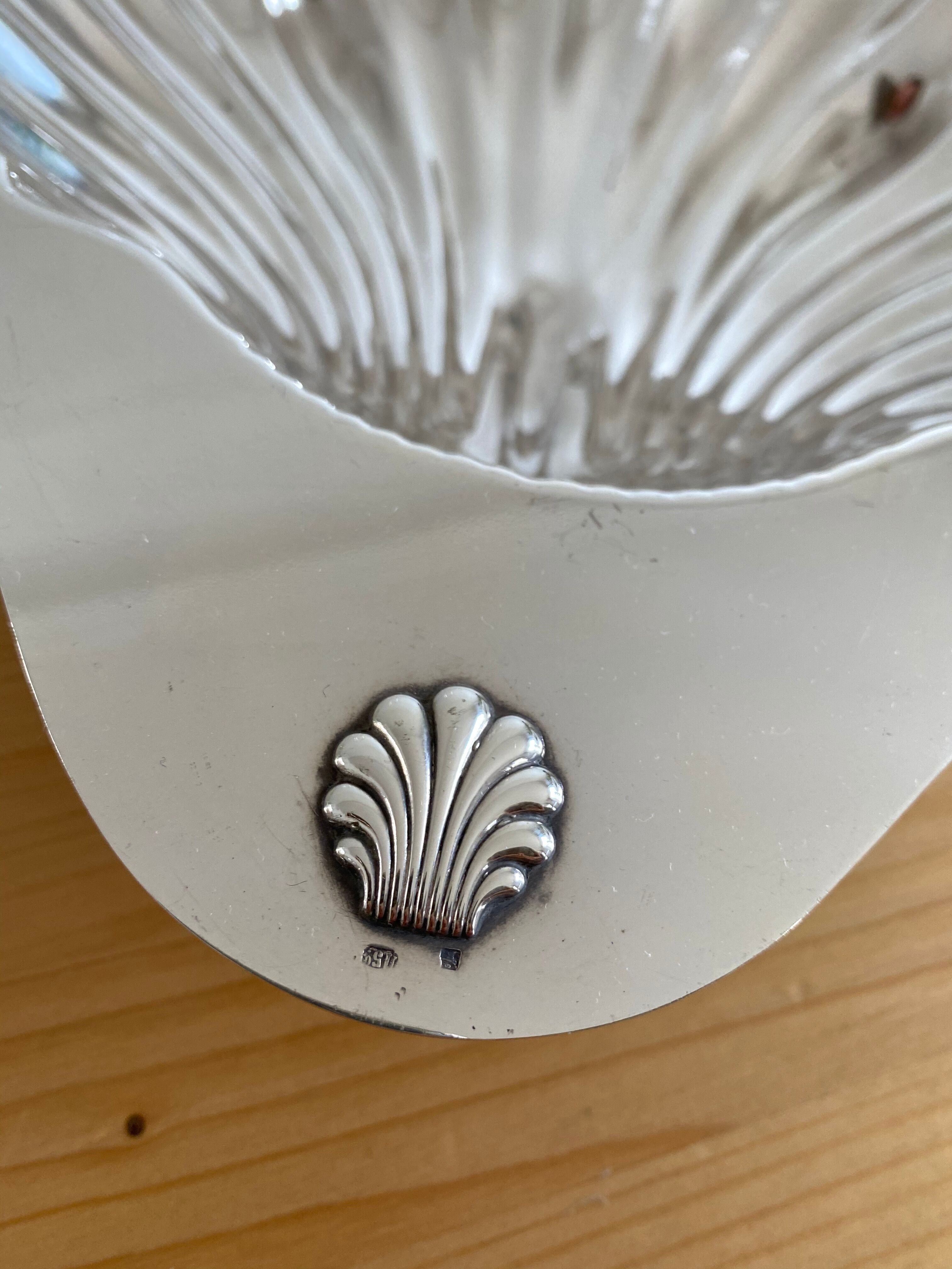 Silver metal cup form shell