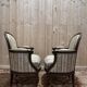 Paire de fauteuils - bergères de style Louis XVI