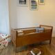 Wooden and wicker baby bed