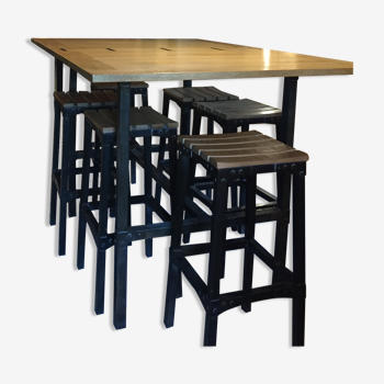 standing oak table and its 6 stools