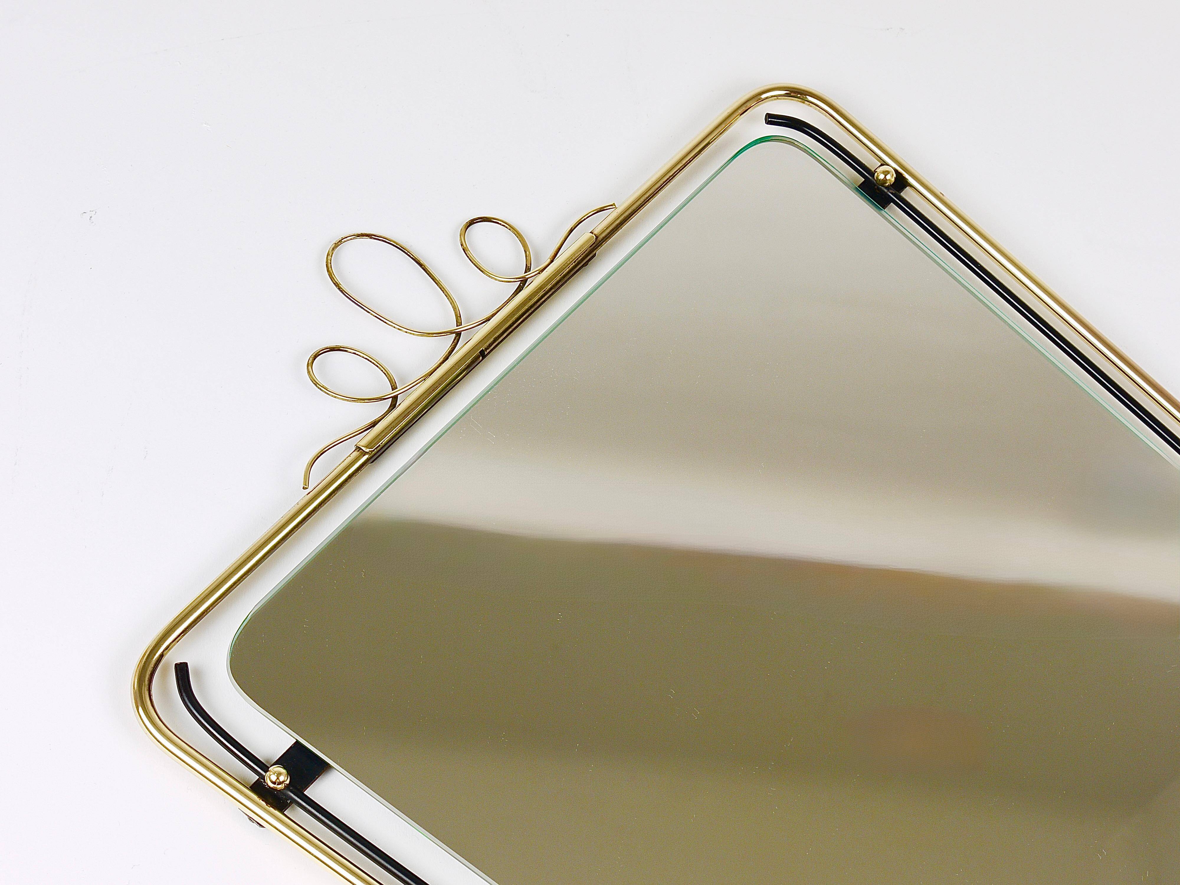 Wall mirror in brass wire with modernist loops from the mid-century, Italy, 1950s.